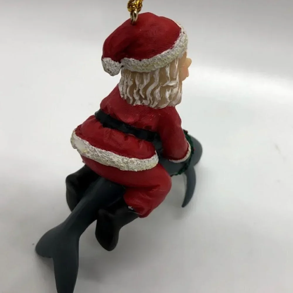 Santa Claus Riding Dolphin Ornament